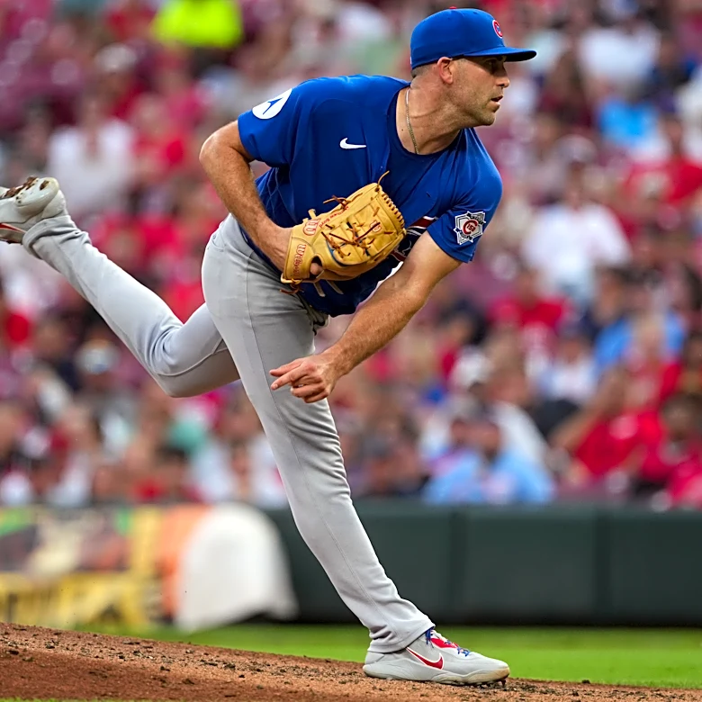 Boyd ends 6-start winless streak, Cubs beat Reds 5-2 to close on playoff berth
