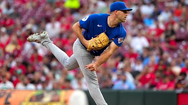 Boyd ends 6-start winless streak, Cubs beat Reds 5-2 to close on playoff berth