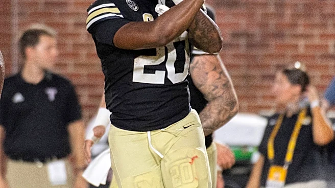 Roberts runs for 122 yards and a TD, No. 20 Missouri hangs on after a slow start to beat Troy 27-17