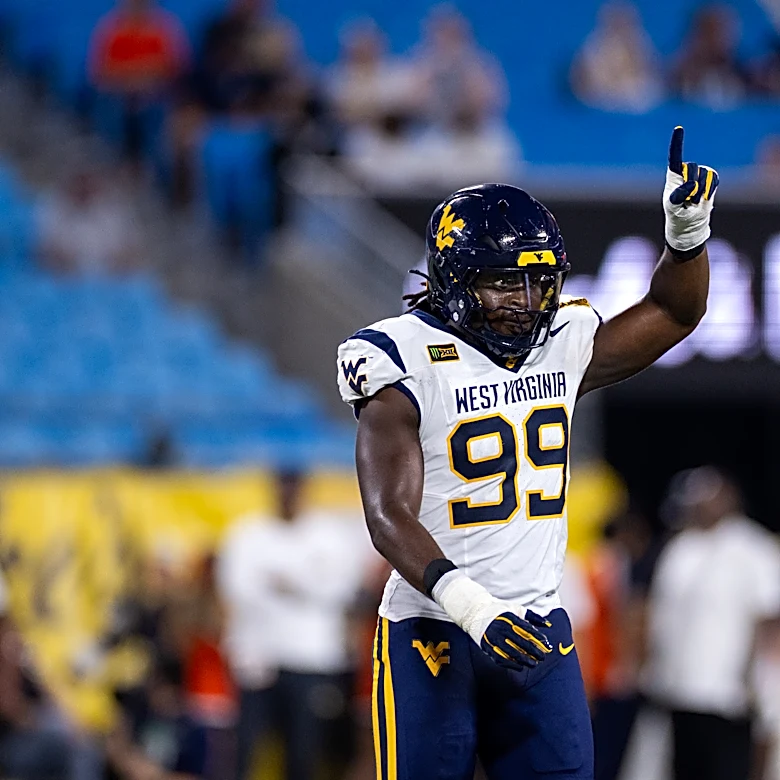 West Virginia beats No. 25 Virginia 38-27 in the Duke’s Mayo Classic