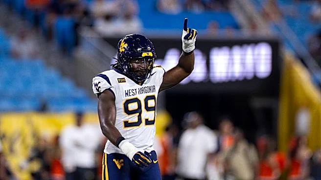 West Virginia beats No. 25 Virginia 38-27 in the Duke’s Mayo Classic