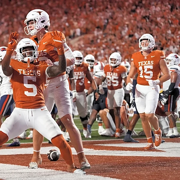 Manning throws 2 early TD passes to Coleman to help No. 1 Texas beat UTSA 30-6