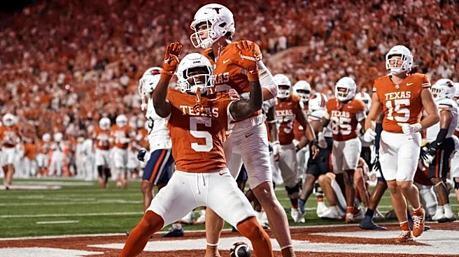 Manning throws 2 early TD passes to Coleman to help No. 1 Texas beat UTSA 30-6