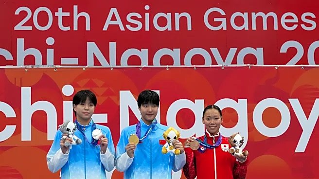 Chinese 13-year-old Yu Zidi starts quickly in the pool at the Asian Games