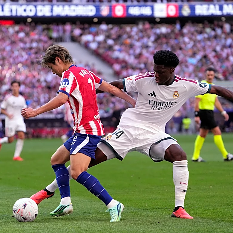 Atletico Madrid beats 10-man Real Madrid 2-1 in derby, Man City outlasts Sunderland in England