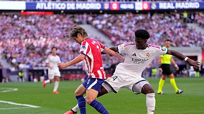 Atletico Madrid beats 10-man Real Madrid 2-1 in derby, Man City outlasts Sunderland in England