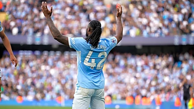 Man City wins 8-goal thriller against Sunderland, Man United rescues late draw