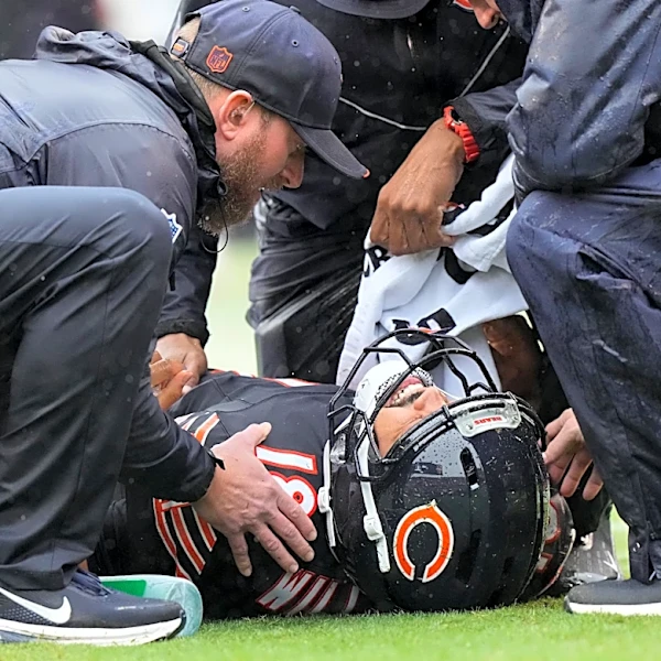 Bears quarterback Caleb Williams carted off with a right hamstring injury