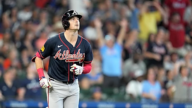 Yastrzemski hits a 3-run homer and the Braves clinch the NL East title with 4-2 win over the Astros