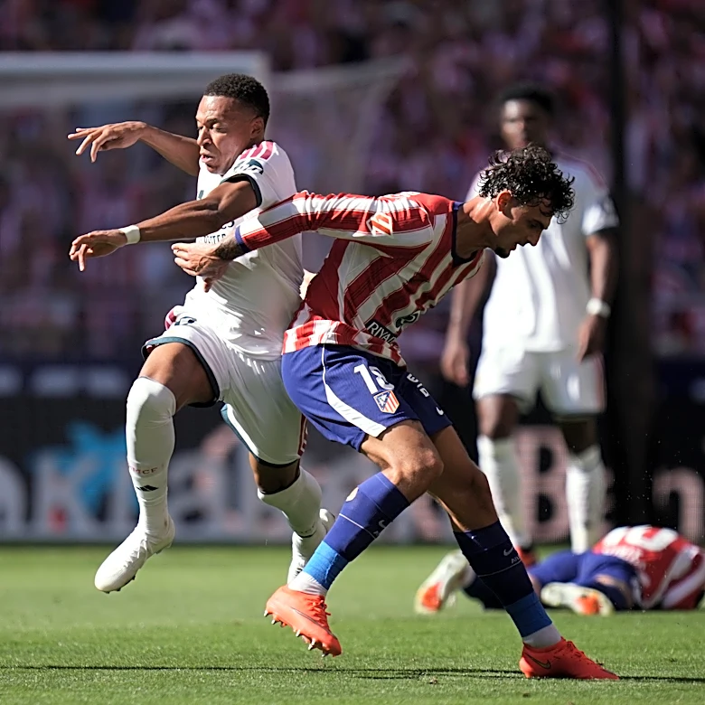 Atletico Madrid beats 10-man Real Madrid 2-1, Man City outlasts Sunderland in Premier League
