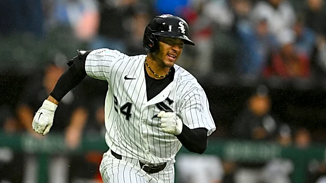 White Sox keep pace in the AL Central with a rain-soaked 8-1 win over the Tigers