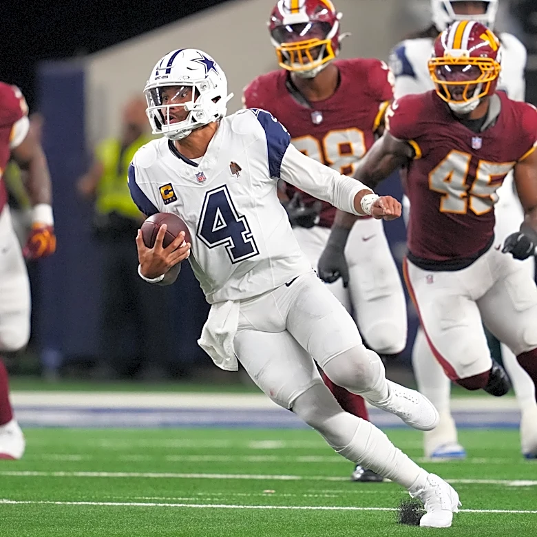 Prescott throws 4 TD passes as Cowboys beat Commanders, who again lose Daniels to dislocated elbow