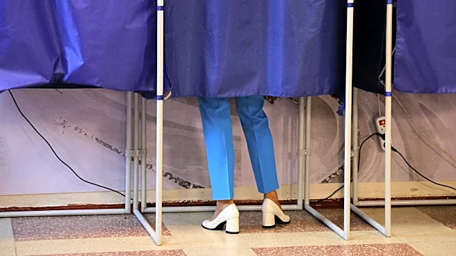 Main Kremlin party keeps control of Russia’s parliament after a carefully orchestrated vote