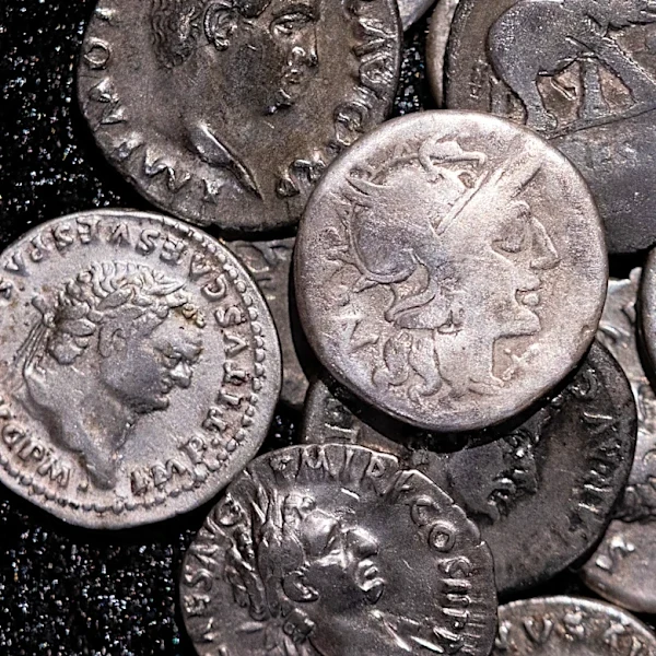 Amateur archaeologist finds Germany’s biggest hoard of ancient Roman silver coins