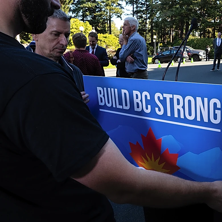 British Columbia leader calls snap election as premier tells voters to say ‘hell no to Trump’