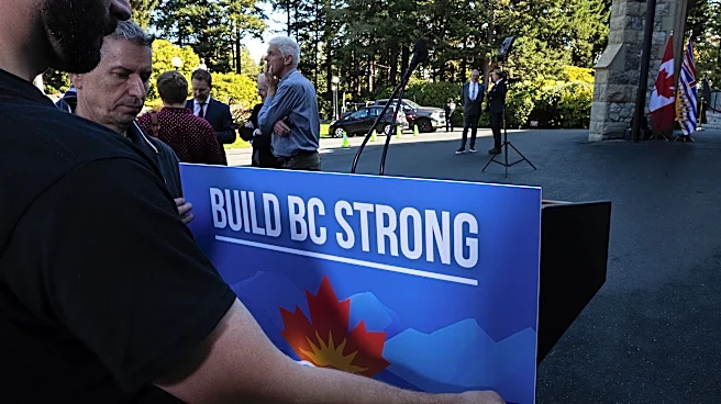 British Columbia leader calls snap election as premier tells voters to say ‘hell no to Trump’