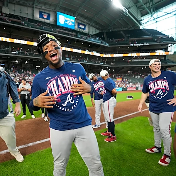 Braves' star Acuña leaves game after fouling ball off left leg