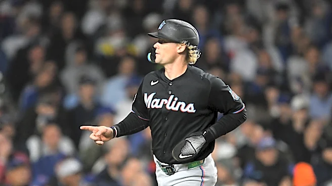 Miami Marlins stymie Chicago's push for NL wild card with 8-2 victory over the Cubs