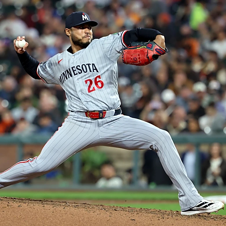 Bradley passes 200 strikeouts, pitches Twins to 3-2 win over Giants