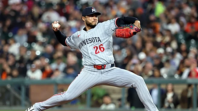 Bradley passes 200 strikeouts, pitches Twins to 3-2 win over Giants