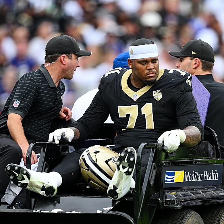 Saints place Banks on IR, reach injury settlement with Estime and sign long snapper Adomitis