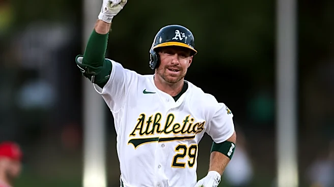 Walton homers and Bolte has 4 hits to lead the Athletics to a 7-3 victory over the Angels
