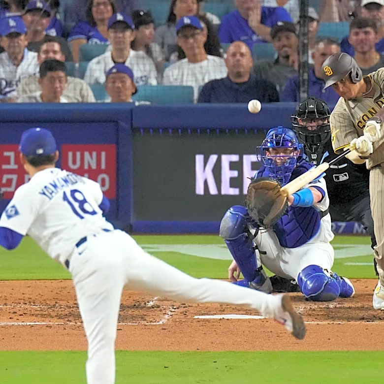 Machado powers the Padres past the Dodgers 5-1, snapping Los Angeles' 11-game home winning streak