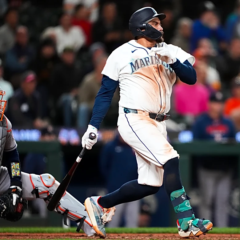 Mariners rally past Astros 6-5 in 10 innings to keep faint playoff hopes alive