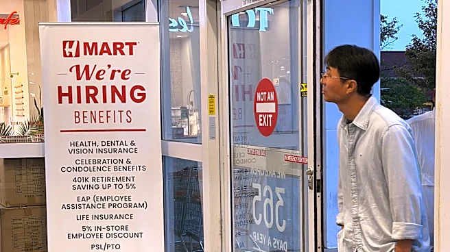 Claims for unemployment benefits drop to 197,000, the lowest since mid-July as layoffs remain rare