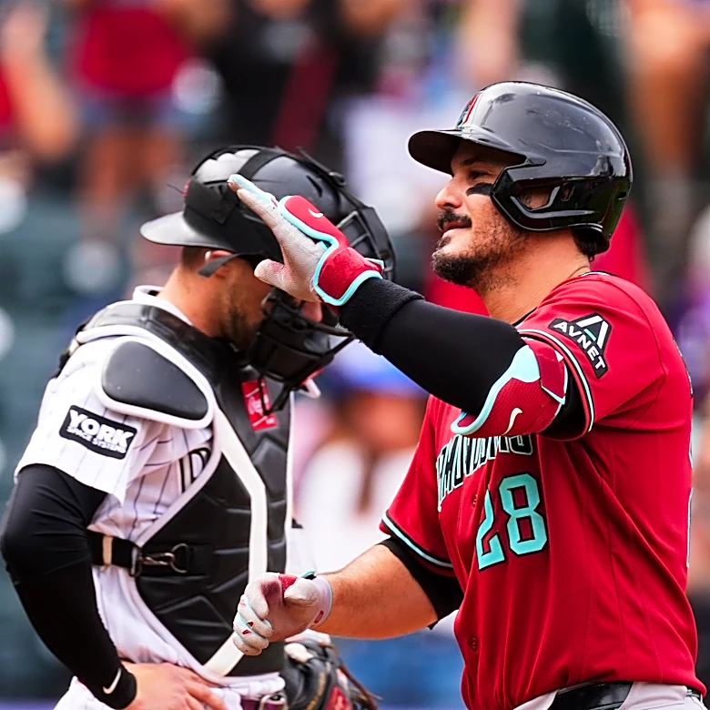 D-Backs maintain slim playoff hopes, beat Rockies 12-8 as Moreno, Arenado hit first-inning homers