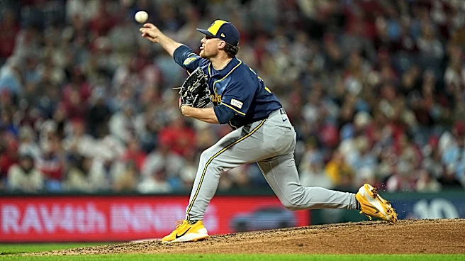 Brewers reach 100 wins for first time, slow Phillies' playoff push with 5-1 victory