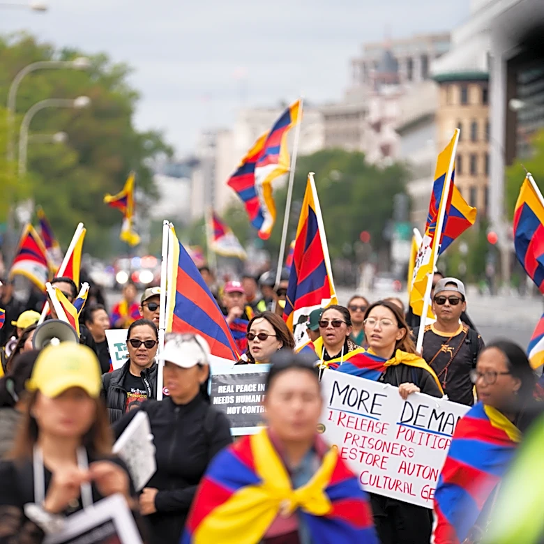 Protesters of Xi's policies push for change in earshot of White House visit with Trump