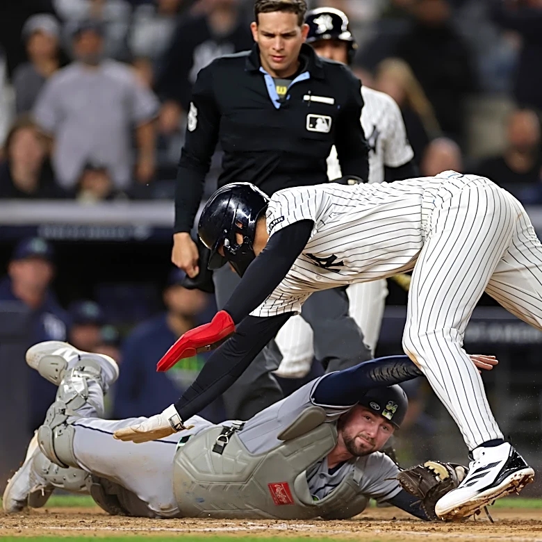 Lombard's incredible slide, tiebreaking homer lift Yanks over Rays. Schlitter finishes with 1.95 ERA