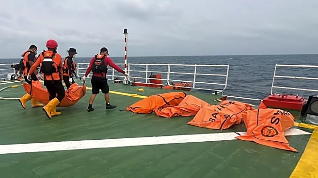 Divers recover a total of 52 bodies from capsized ferry in Indonesia after a dayslong search