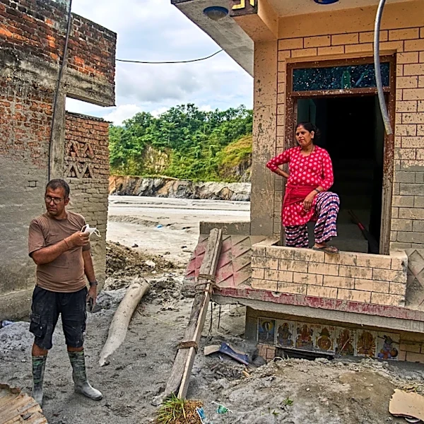 A month after Nepal floods, thousands are still missing and families face a long recovery