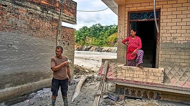 A month after Nepal floods, thousands are still missing and families face a long recovery