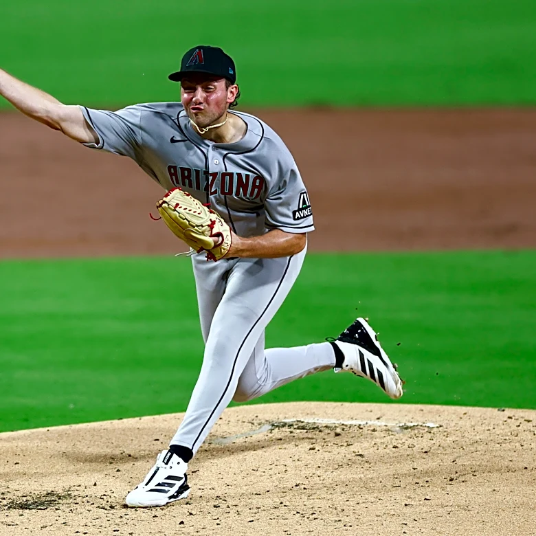 Arenado, Perdomo lead Diamondbacks over Padres 11-4 to stay alive in wild-card hunt
