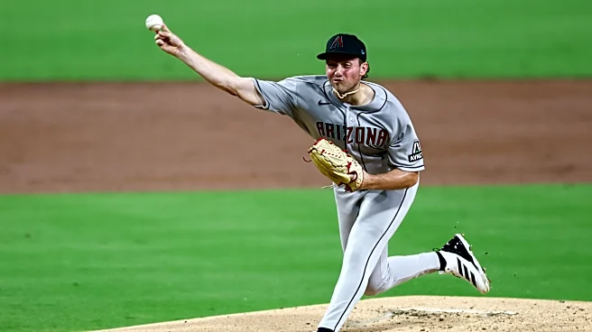 Arenado, Perdomo lead Diamondbacks over Padres 11-4 to stay alive in wild-card hunt