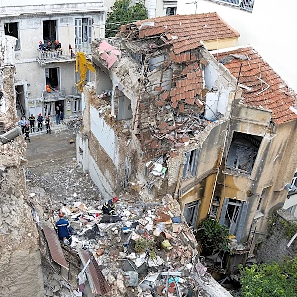 Rescuers pull 4 unconscious from collapsed building near the Acropolis in Greece