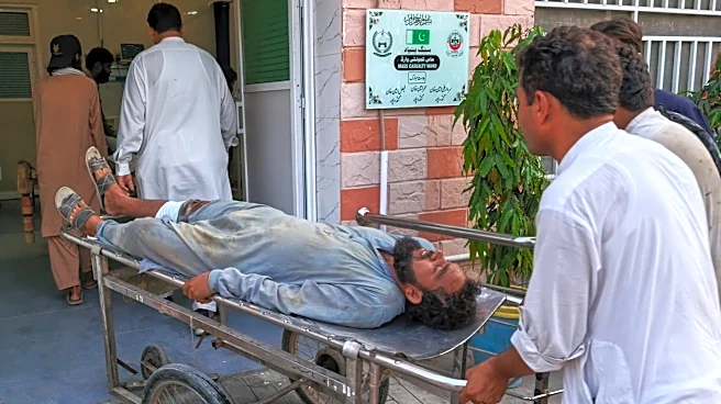 Gunmen target ambulance in Pakistan after suicide bombing at checkpoint killed 12