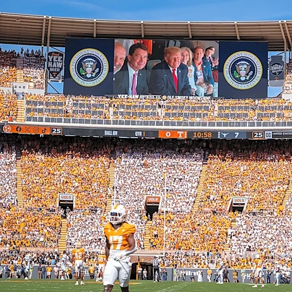 Trump attends Texas-Tennessee game with no apparent disruption to coaches' communications