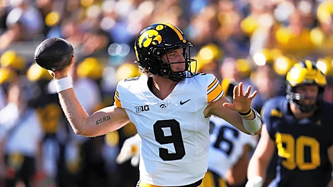 No. 17 Iowa drives for last-play TD to beat No. 18 Michigan 20-19