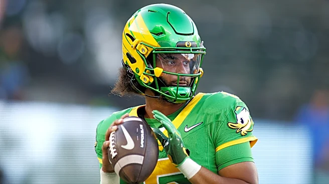 Oregon QB Dante Moore leaves field on cart, in neck brace after late hit from USC's Desman Stephens