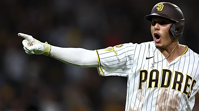 Machado homers as Padres beat D-backs 10-7 to clinch home field in wild-card round vs Cubs