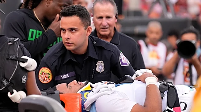 Oregon QB Dante Moore leaves field in ambulance after late hit. His Ducks rally for a stirring win