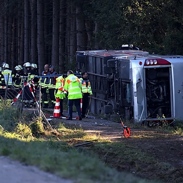 Bus carrying Filipino tourists overturns on way to Germany's Oktoberfest, killing 2