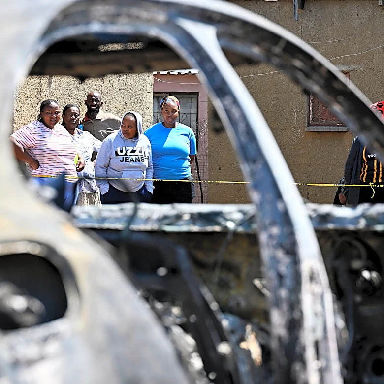 Police hunt gunmen after 2 mass shootings in South Africa leave at least 27 dead