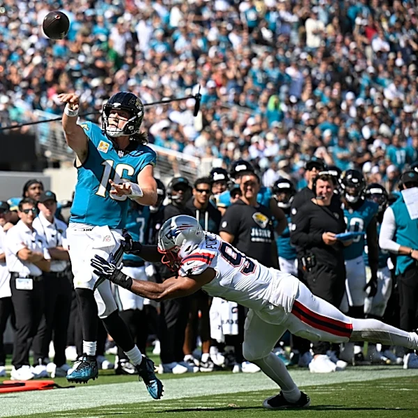 Lawrence throws 3 TD passes as Jaguars rout Patriots and raise more questions about Maye