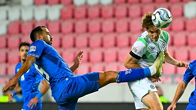Ireland players wear black armbands and refrain from handshakes in soccer game against Israel