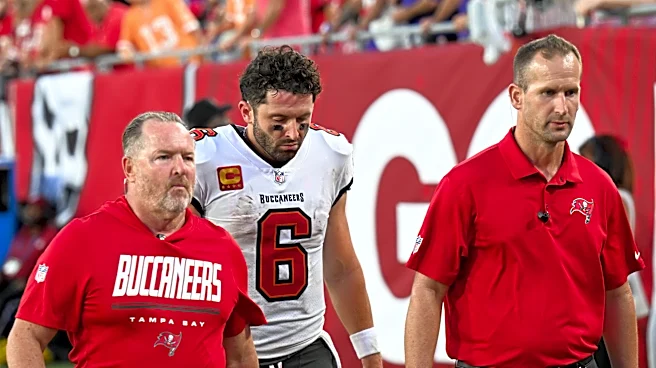 Baker Mayfield dislocates thumb on throwing hand and winless Buccaneers await results of MRI